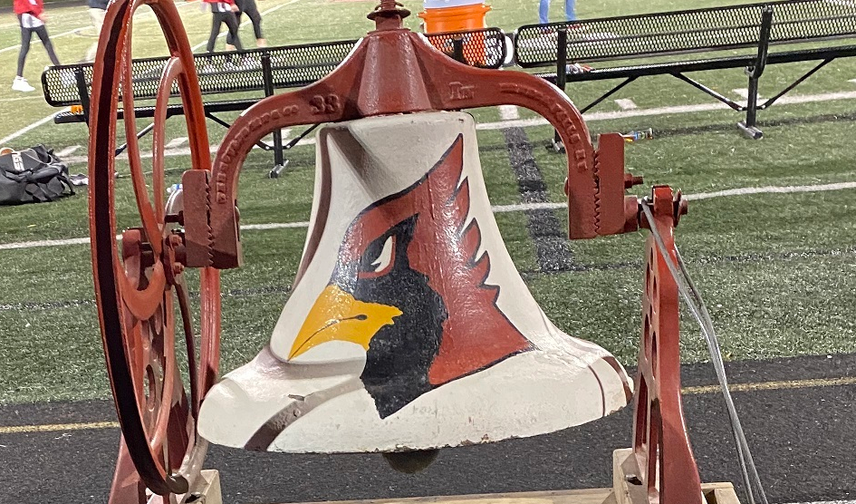 The cardinal bell on the football field.