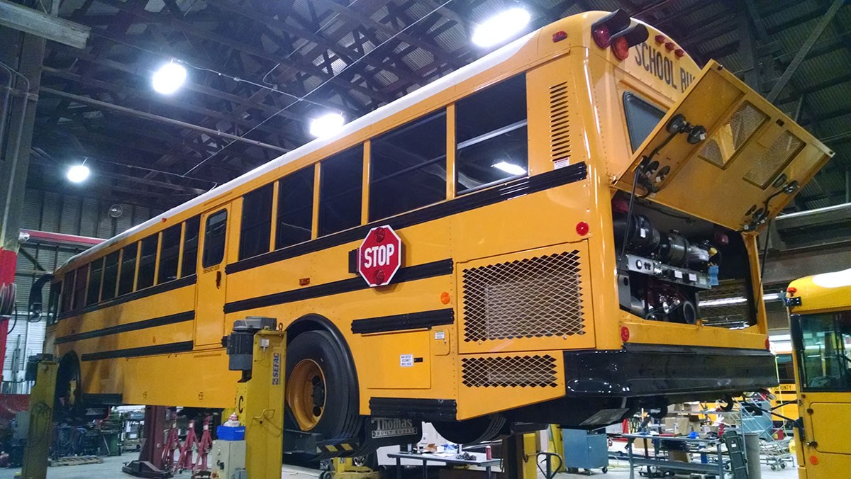 School bus in the shop