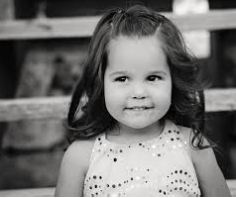 Black and white photo of a little girl