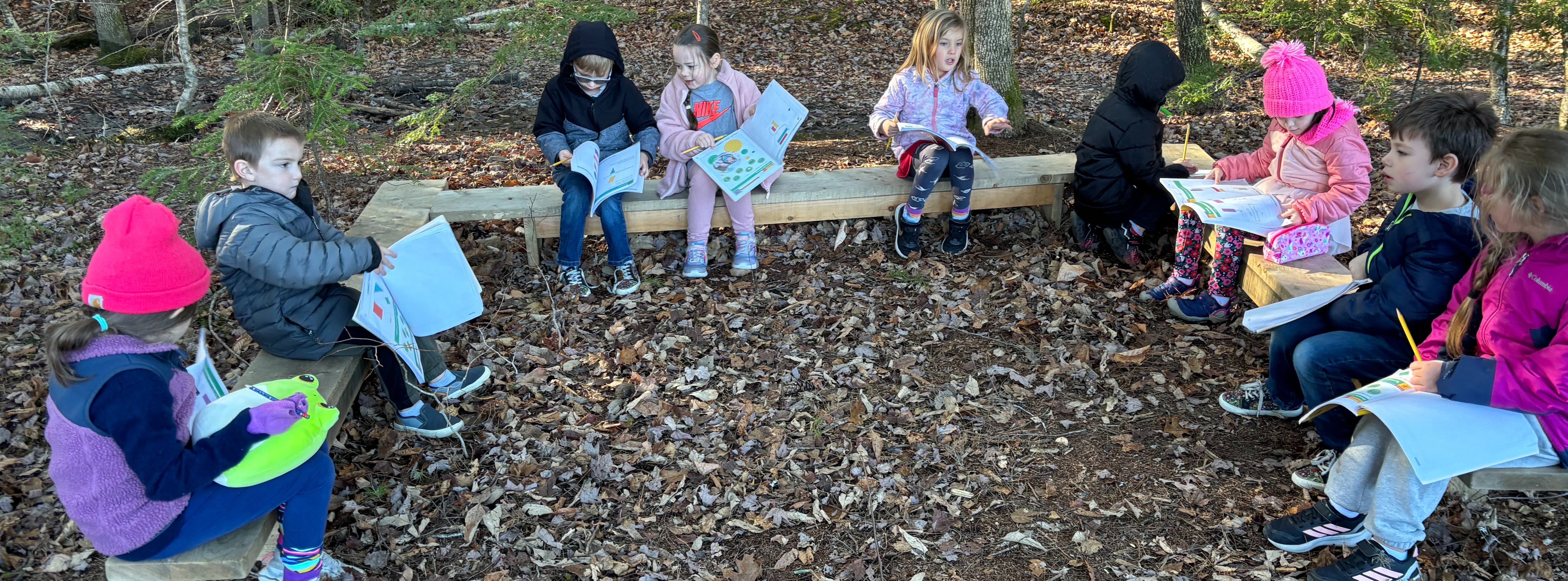 Kindergarten having fun learning outside!