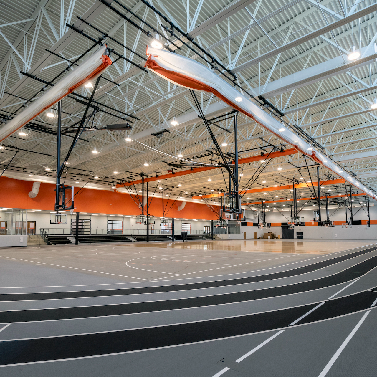 interior gym with basketball court and track