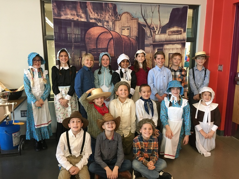 Students dressed in Western pioneer clothes