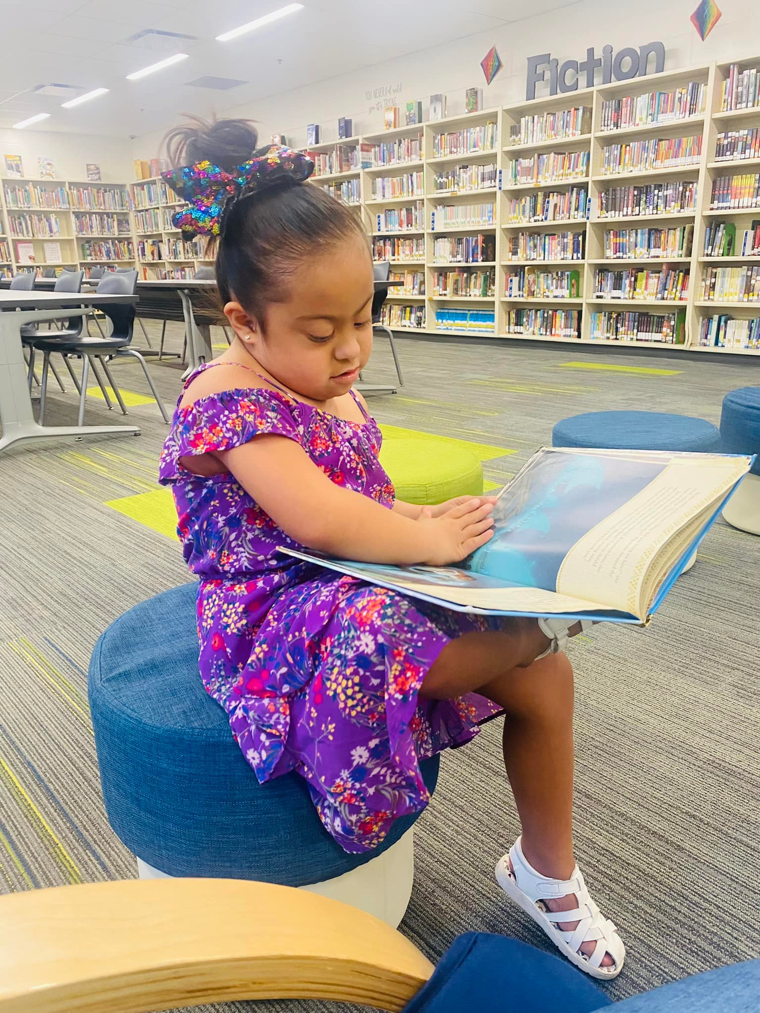Student reading in the Washington Elementary Library