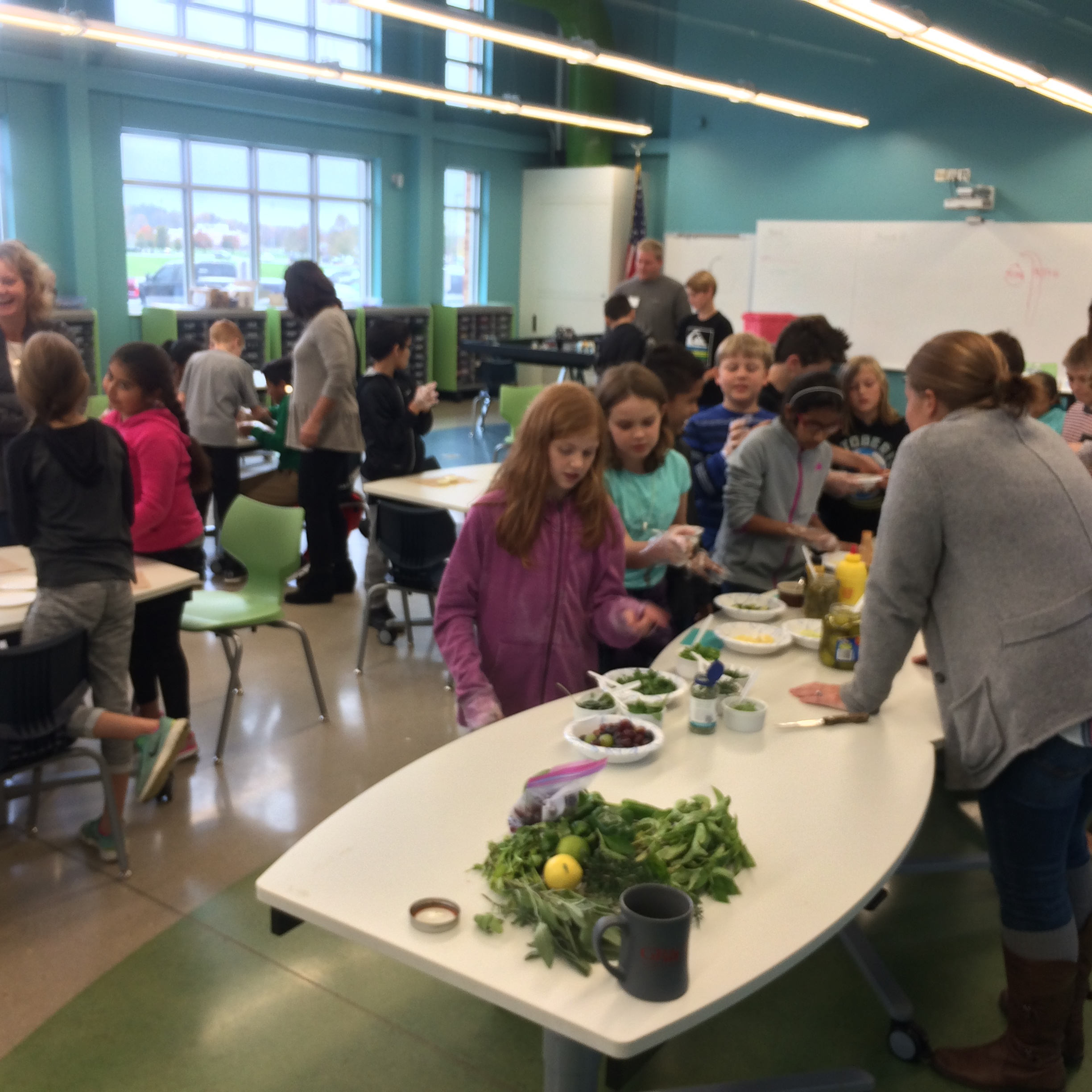 Students in line with various foods