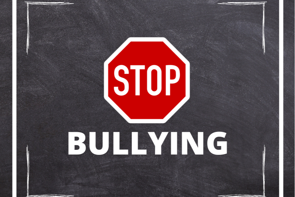 A chalk board with the a Stop sign and the words "Bullying" underneath