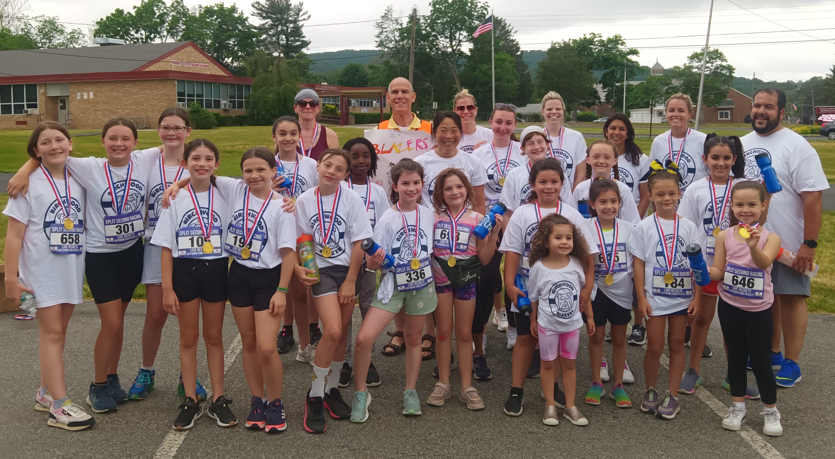 Dr. Corbett with students and community members at the Rotary 5K at Birchwood
