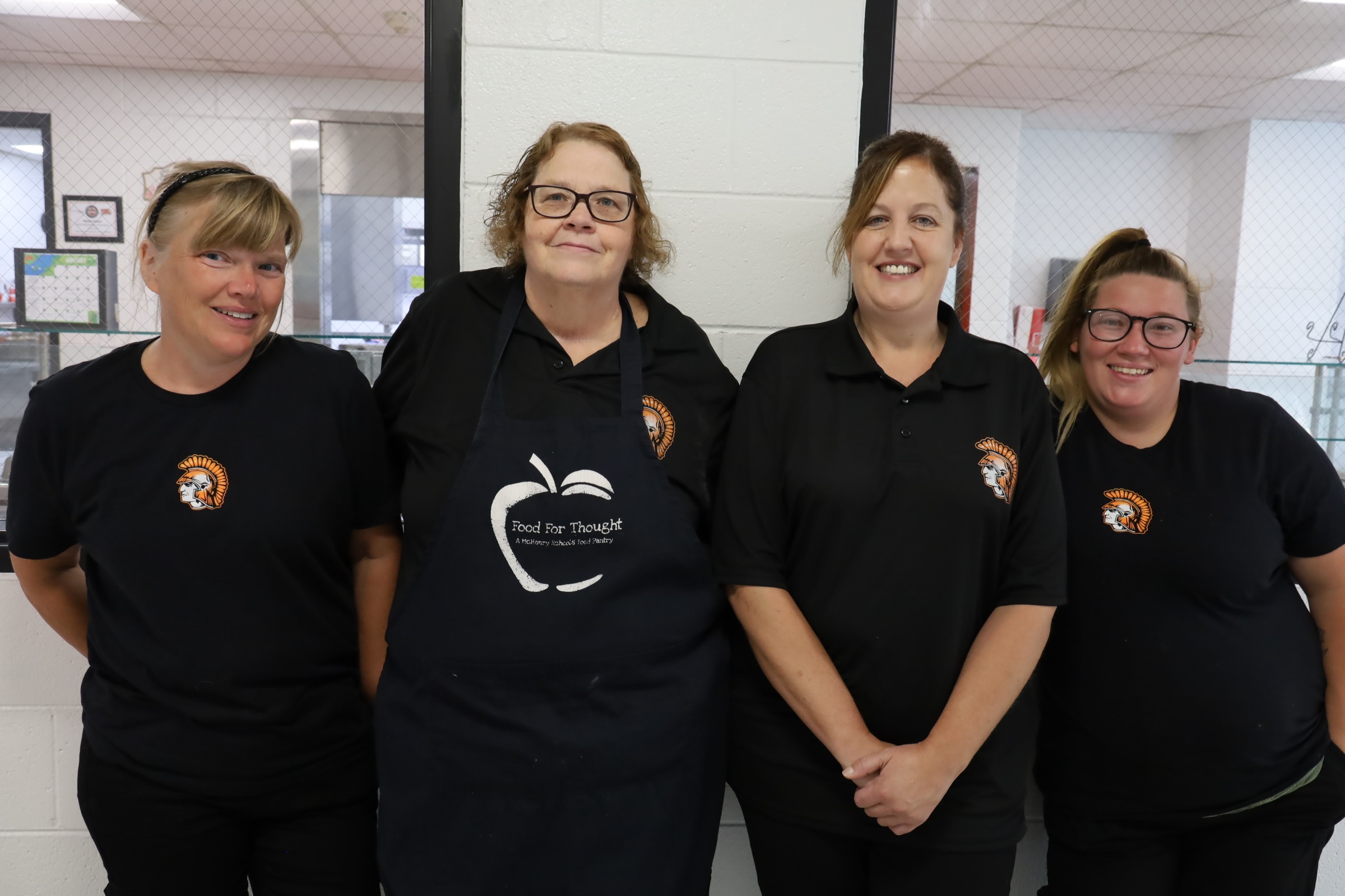 Four members of Food Service staff at Freshman Campus