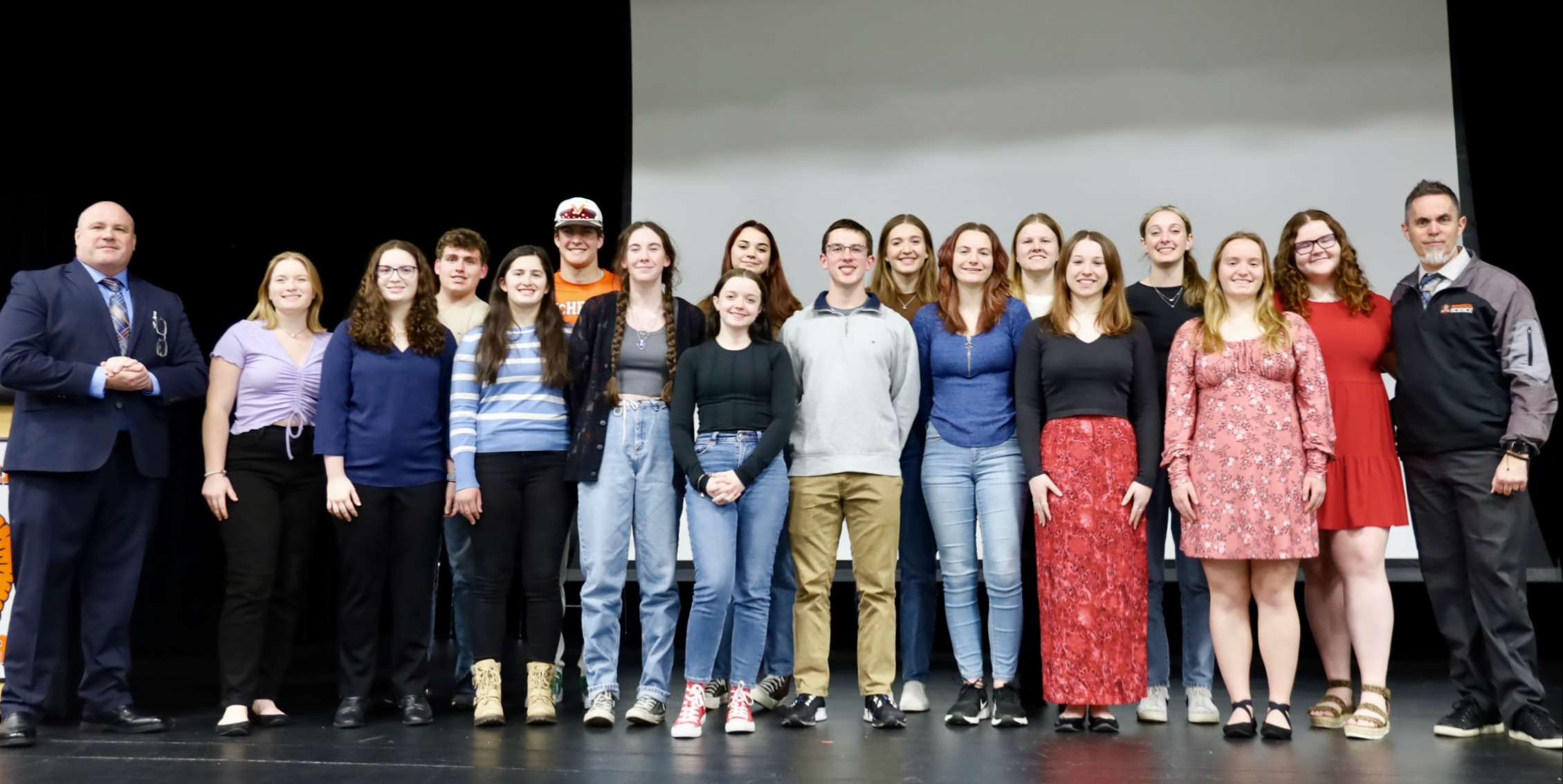 Illinois State Scholars 2022 group photo on stage with superintendent and princiapl