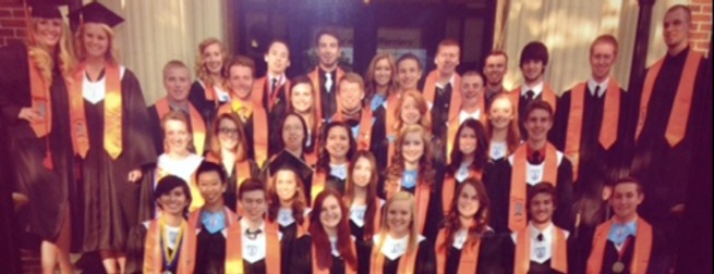 Class of 2014 East Campus Distinguished Warriors in stoles and graduation robes