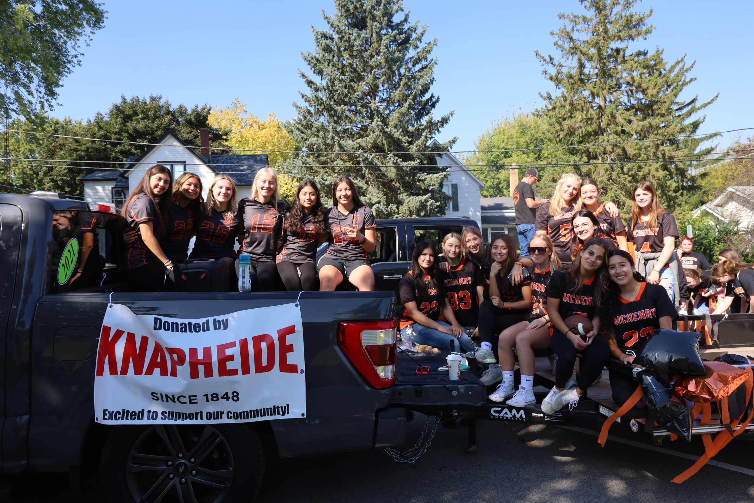 Students on float for homecoming parade