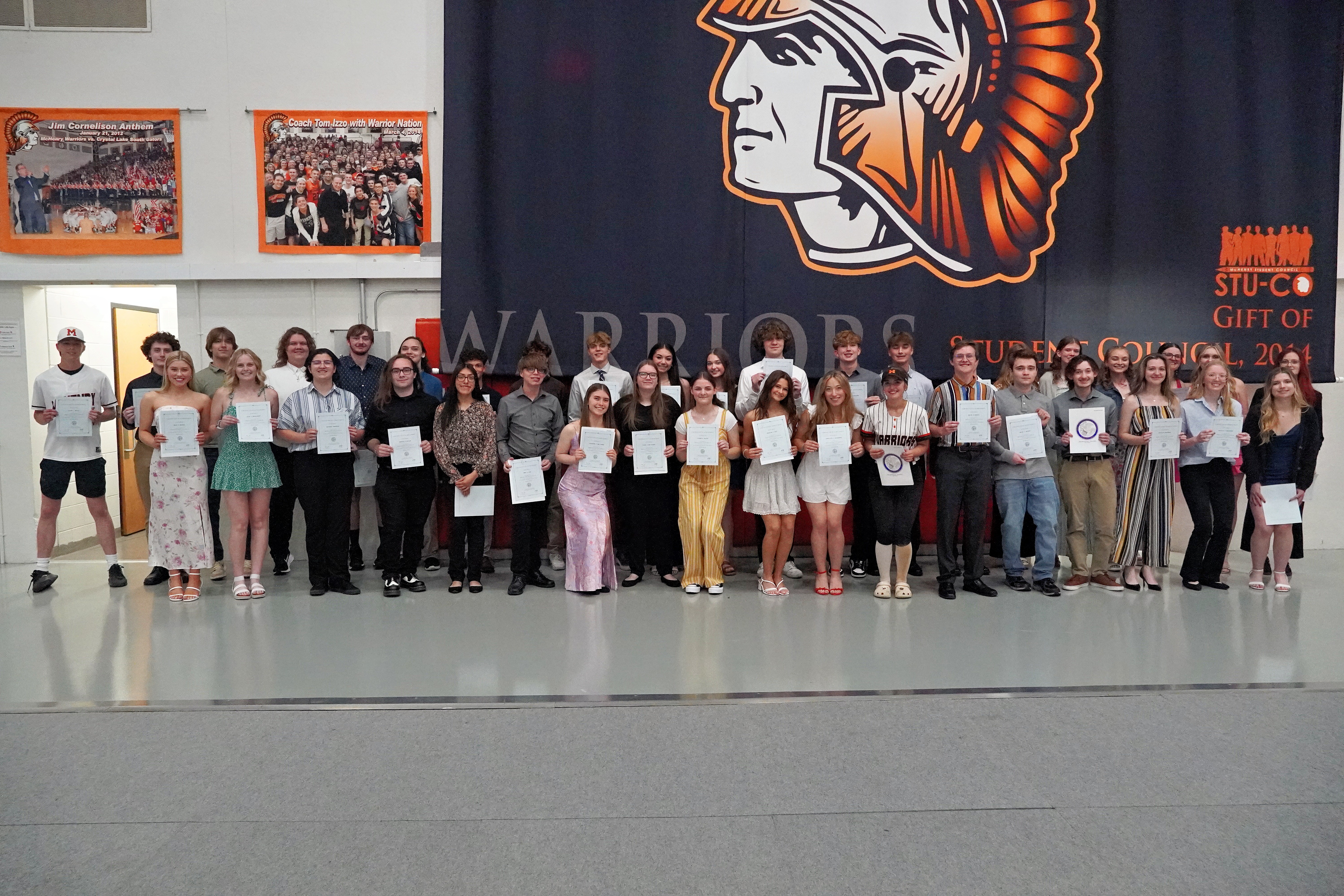 State scholars holding their awards