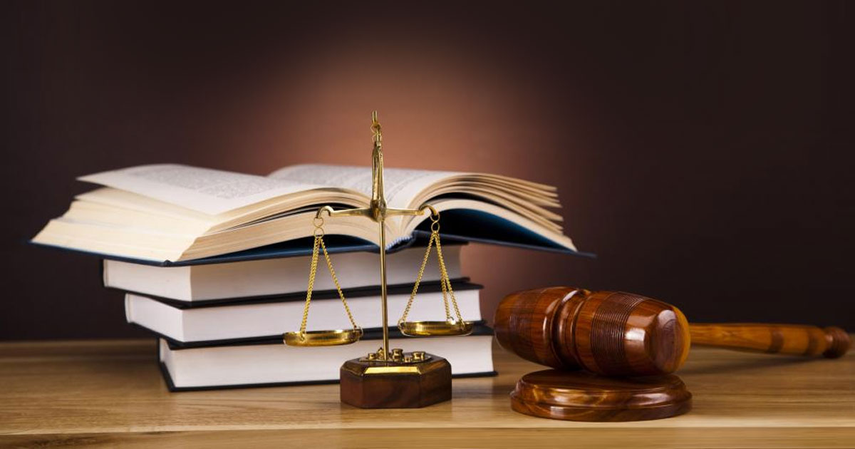 Balancing scale, books, and a gavel