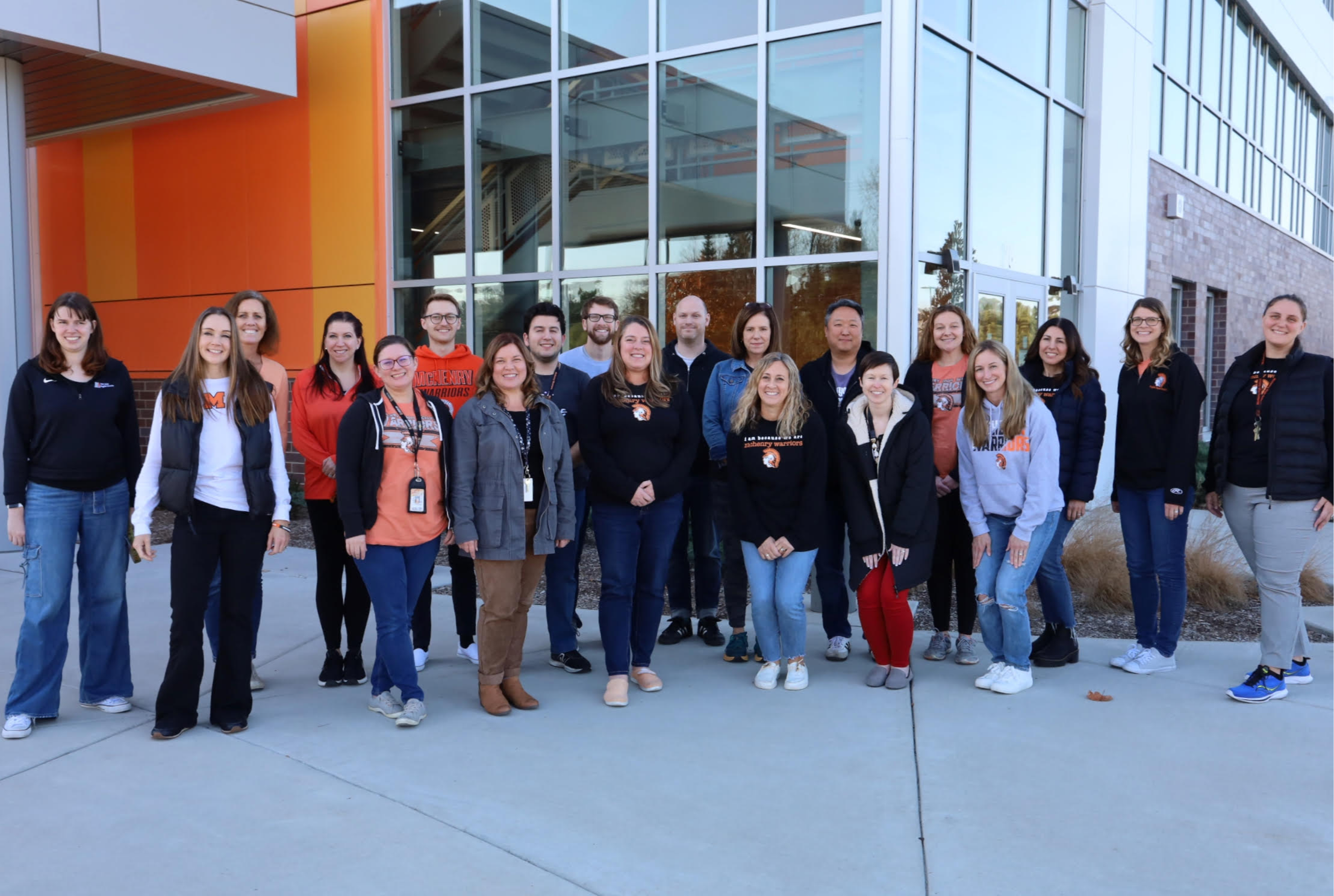 English Division group standing outside in front of Upper Campus