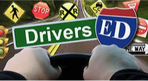 Drivers Ed with different road signs and hand driving a wheel