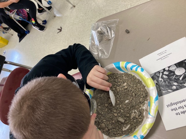 Kid playing with dirt