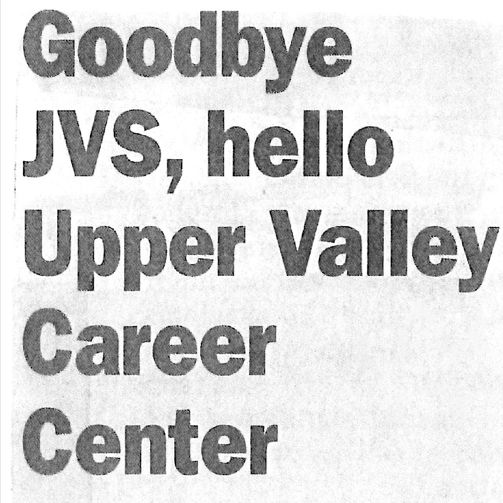 A poster with blue and white colors reads, "Goodbye JVS, hello Upper Valley Career Center" with a 2011 date.