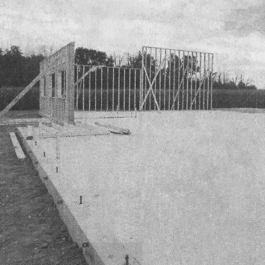 An adult male stands in front of a building under construction with "2017" and "Throwback Thursday" in the upper left corner.