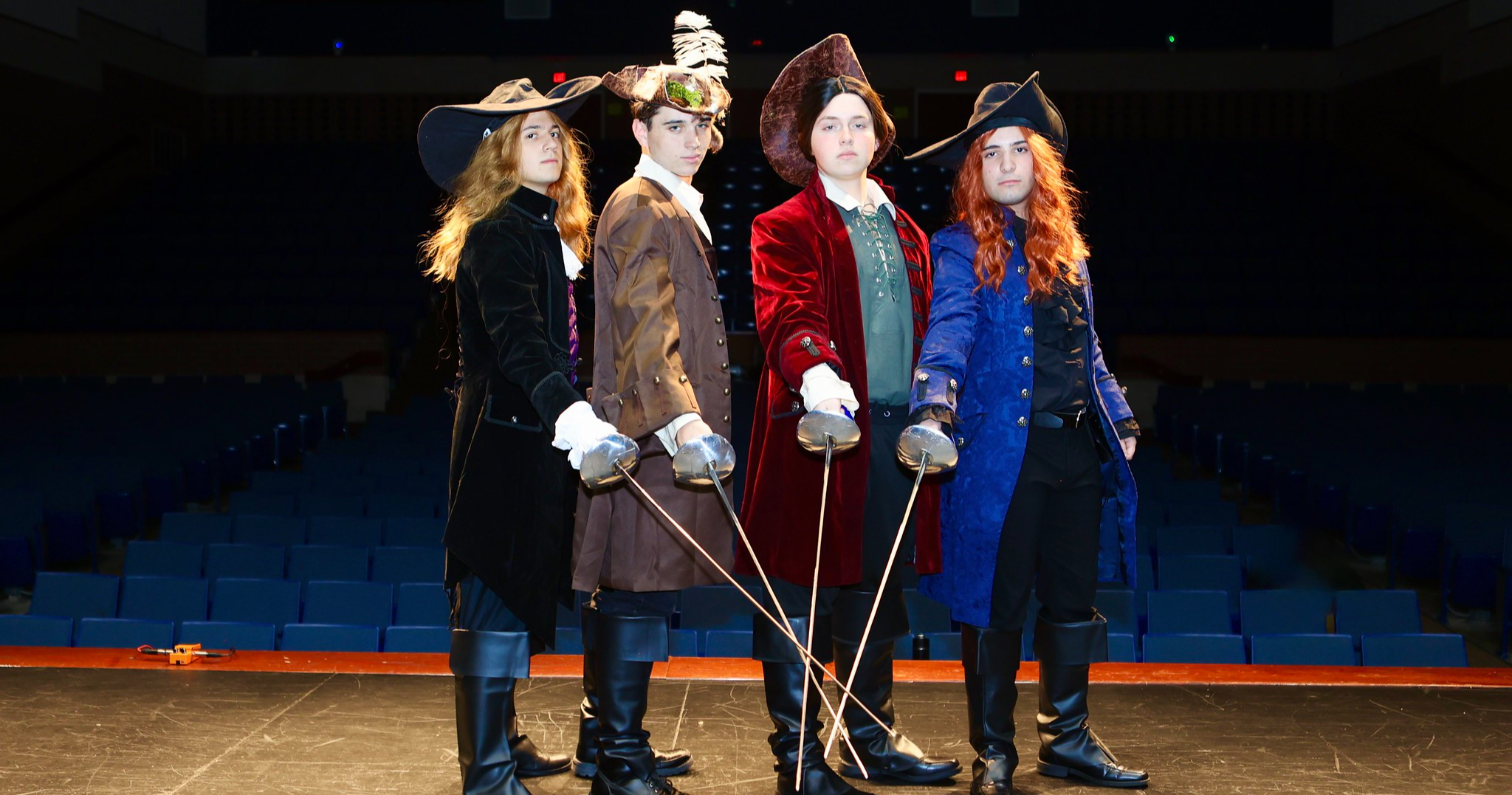 students actors as musketeers