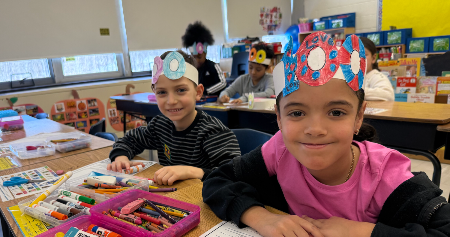 two students sitting at a table