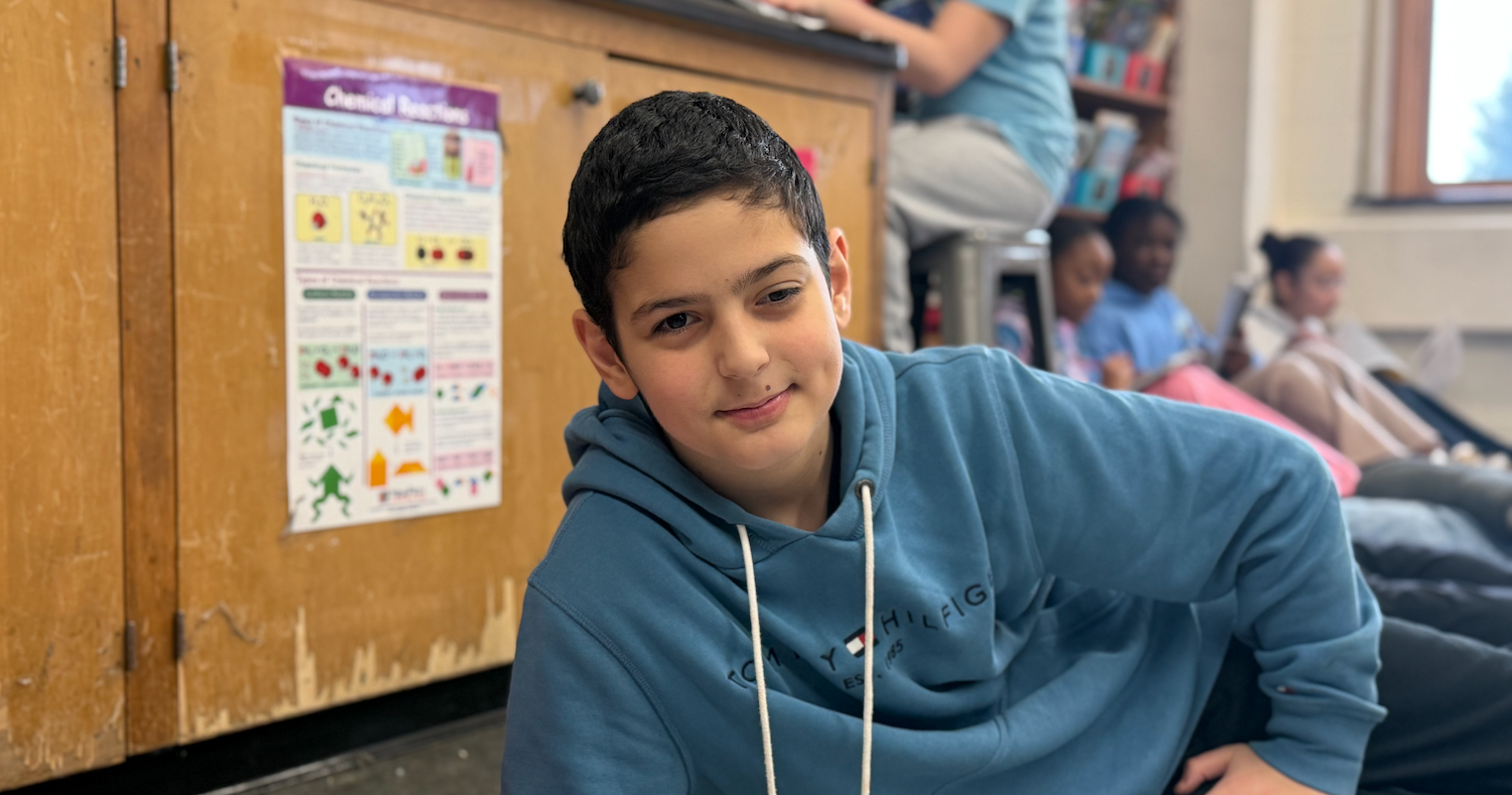 student with blue shirt