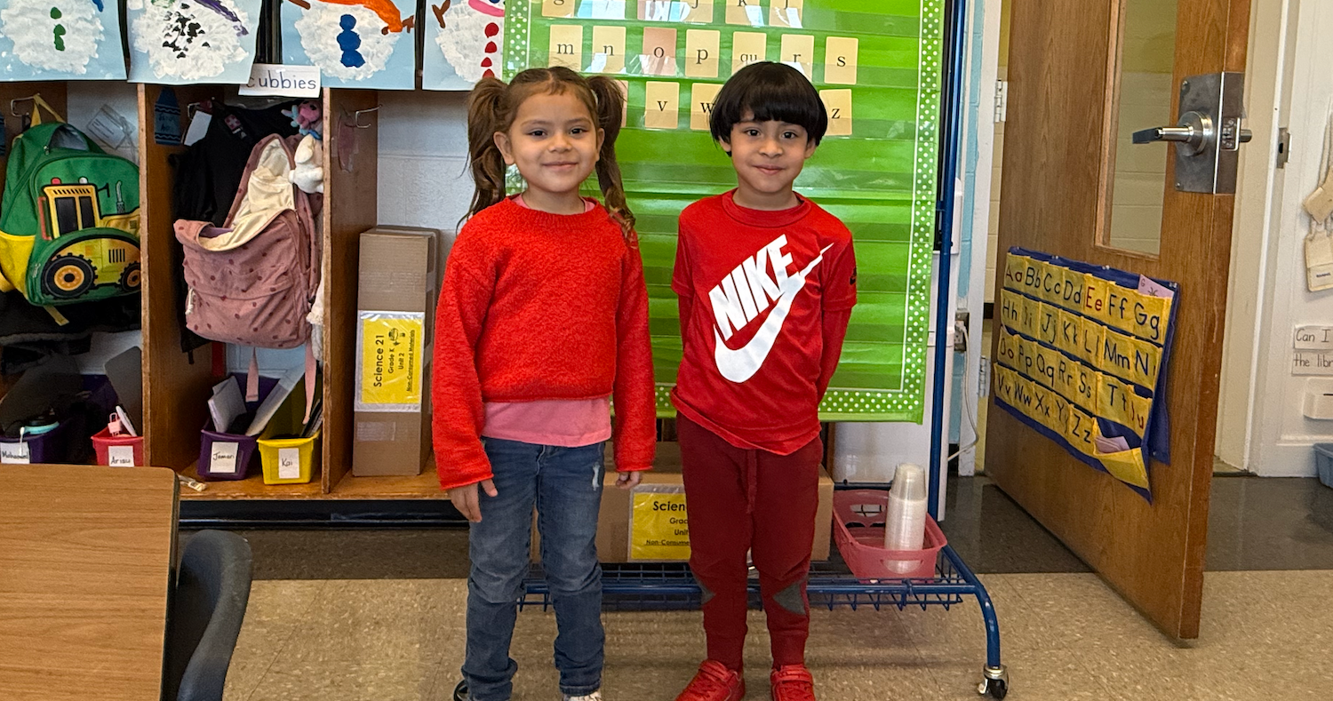 two students wearing red shirts