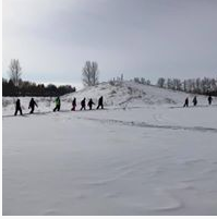A photo of students playing in the snow.