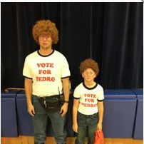 A photo of 2 persons dressed like Napoleon Dynamite.
