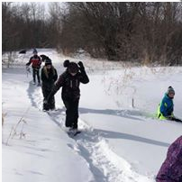 A photo of students playing in the snow.