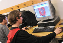 A boy working on their computer