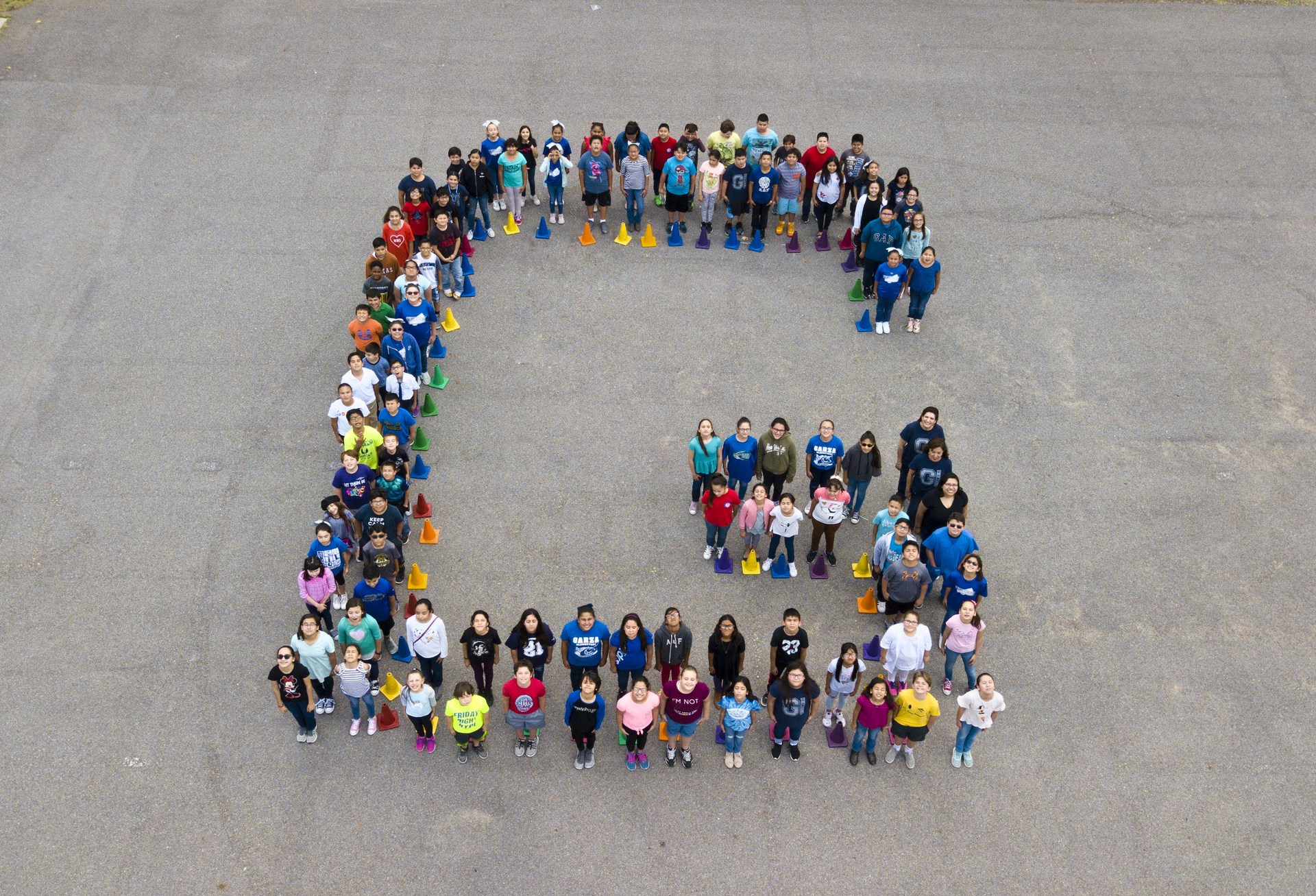 Students In a letter G formation