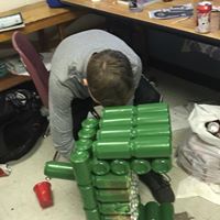 Member painted the cans green