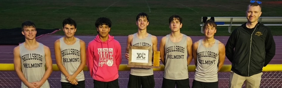 Boys' Cross Country team first place photo with plaque.