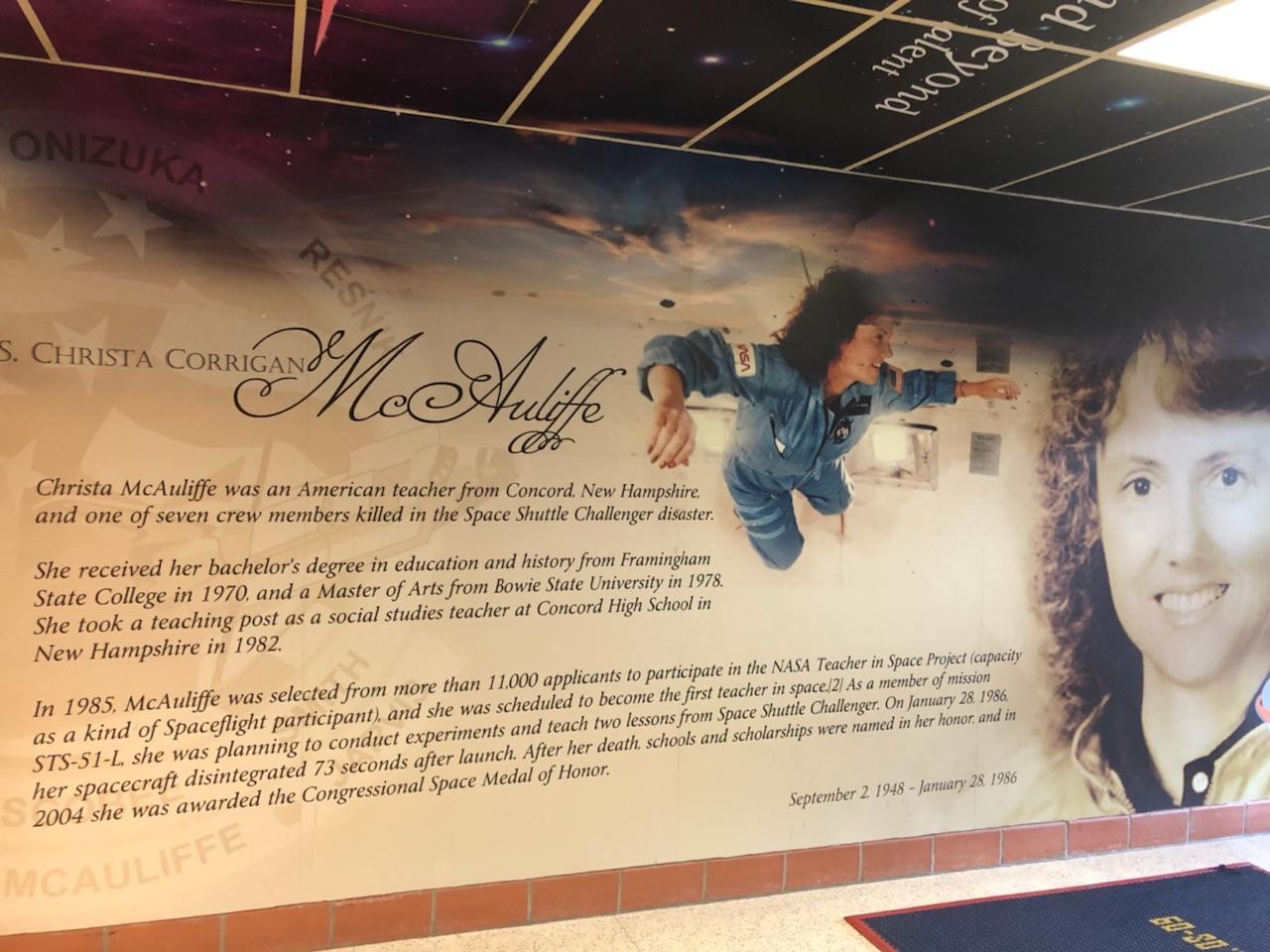 A photo of the plaque detailing Christa McAuliffe's life.