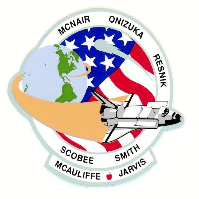 A photo of the logo, a space shuttle over an American flag.