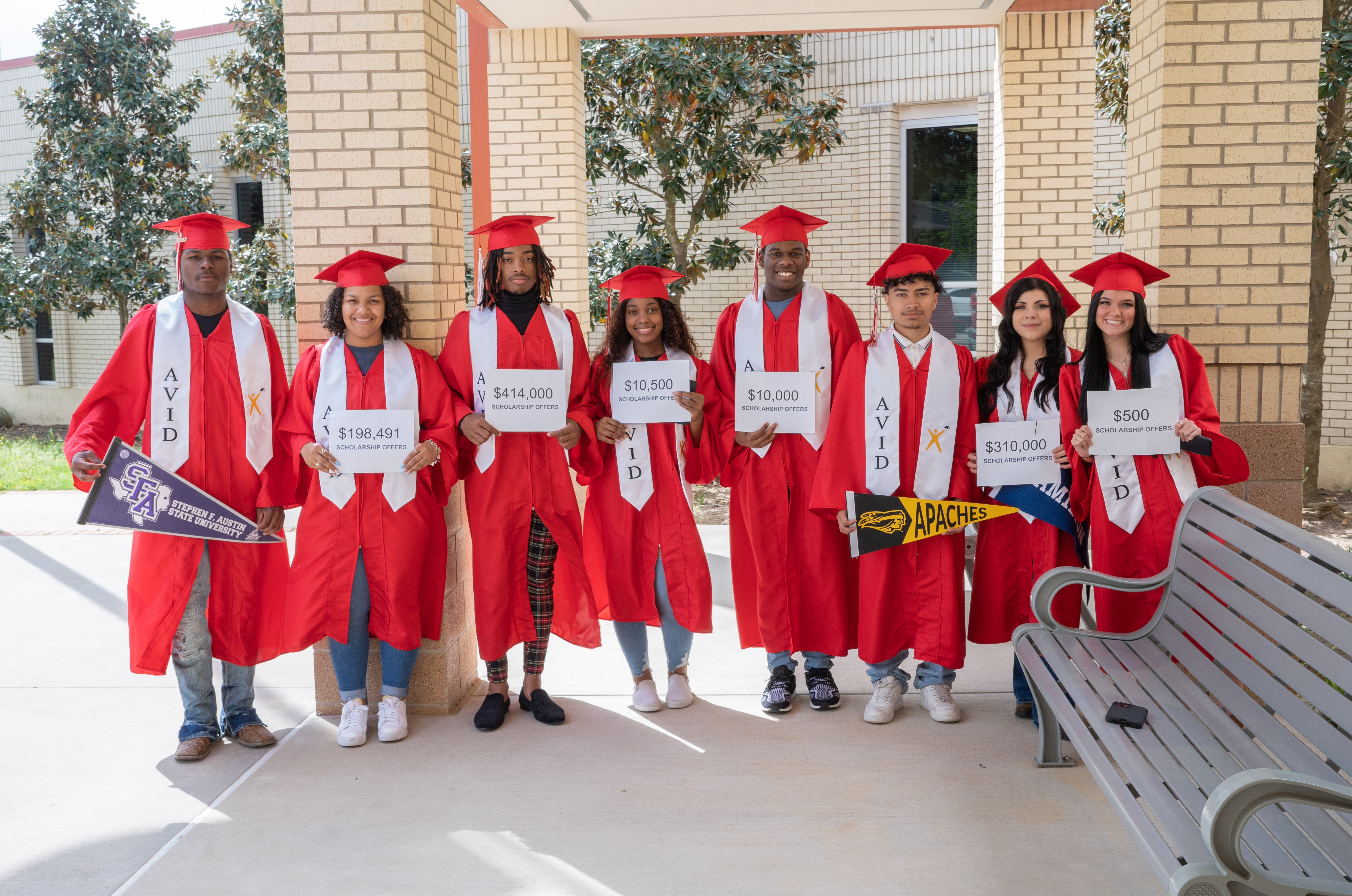 students showing their scholarship totals