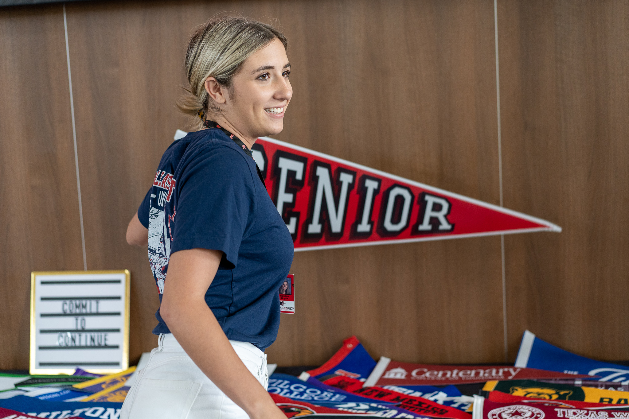 senior choosing college flag