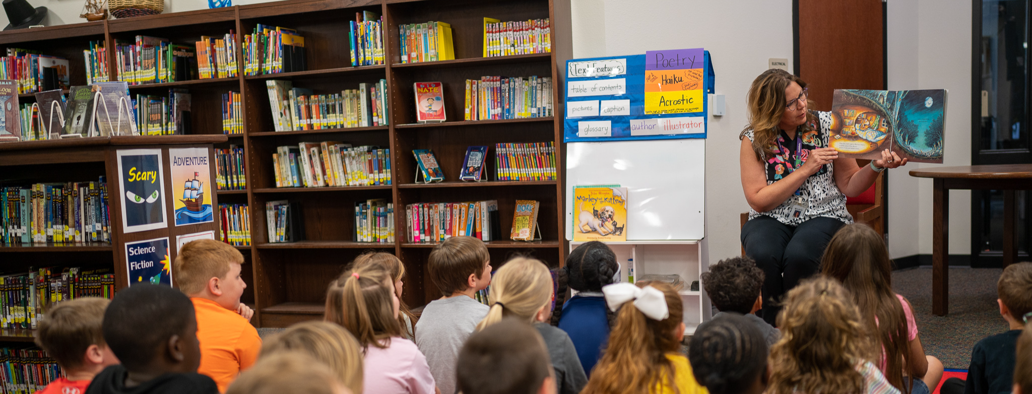 librarian reading to students