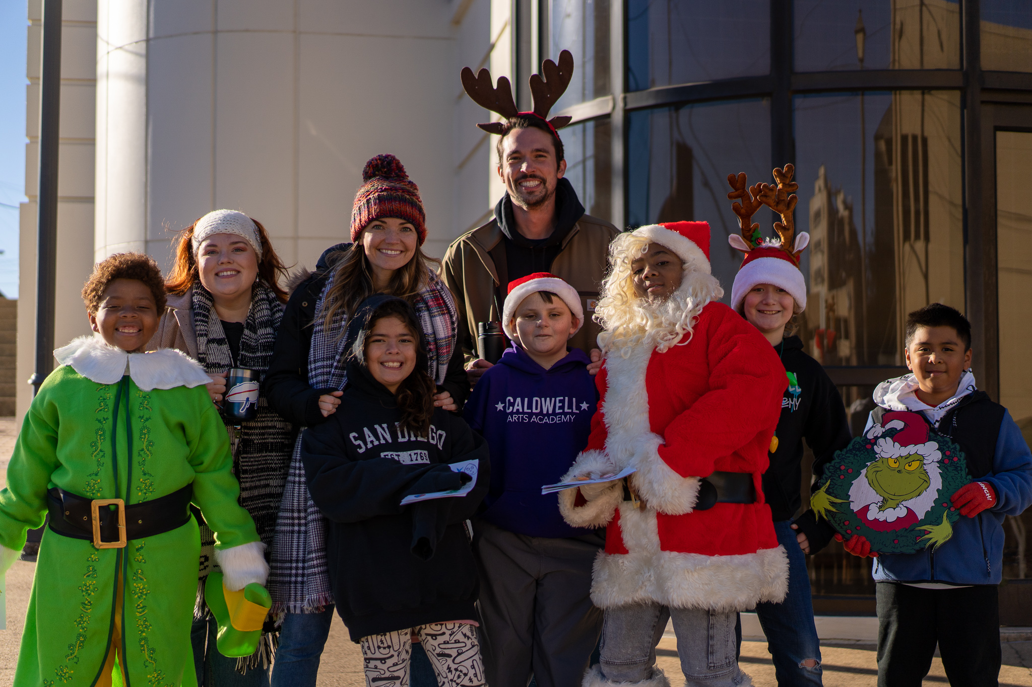 students dressed up as Grinch, reindeer, Santa