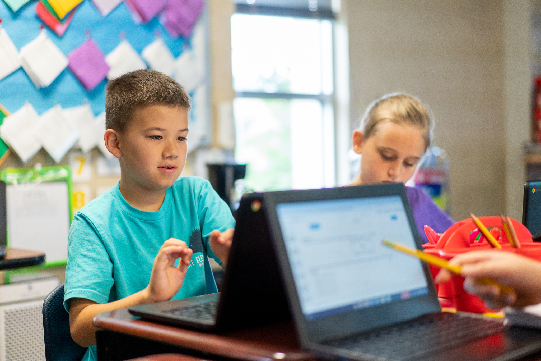 student with chromebook