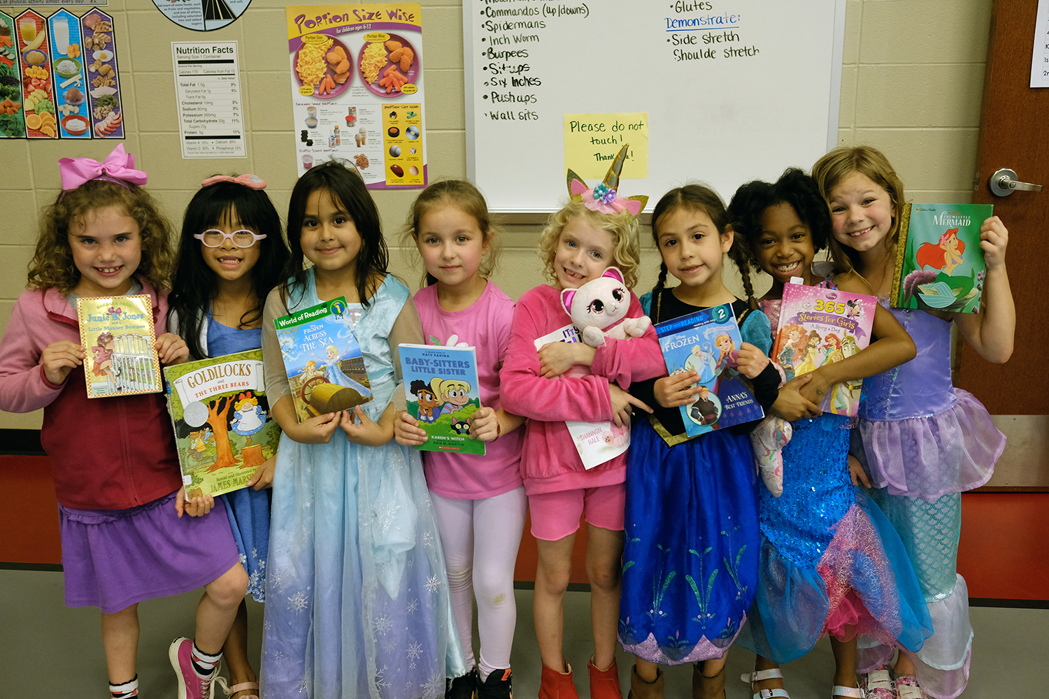 elementary aged girls dressed up as book characters