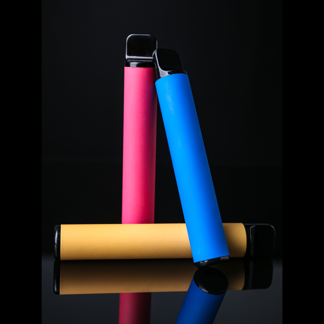 yellow, pink, and blue vape pens