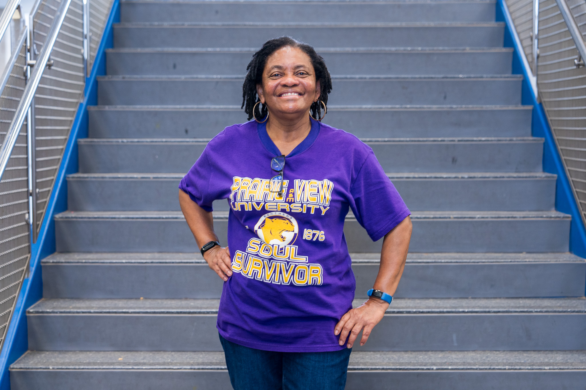 African American woman wearing a college shirt