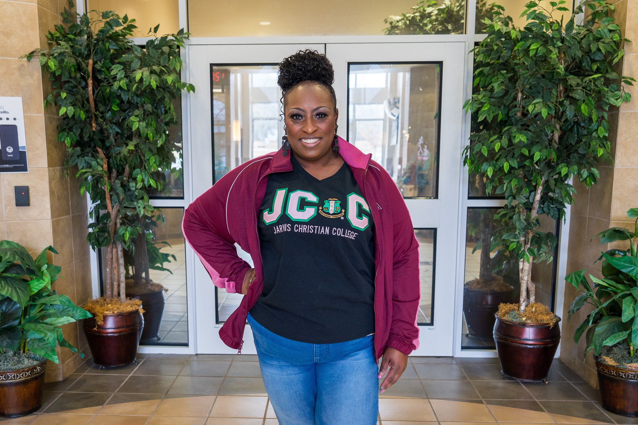 African American woman wearing a college shirt