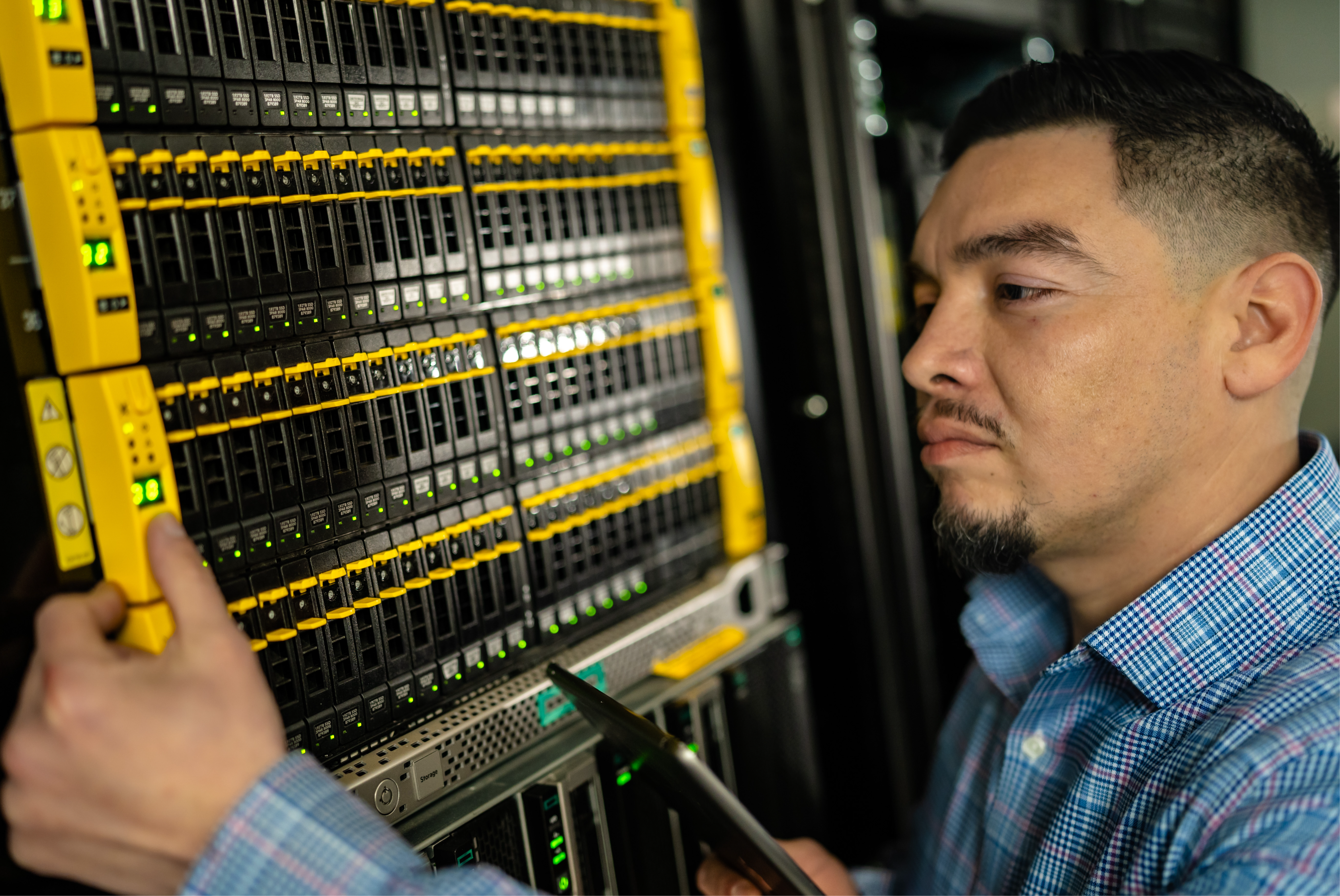 man working on computer server