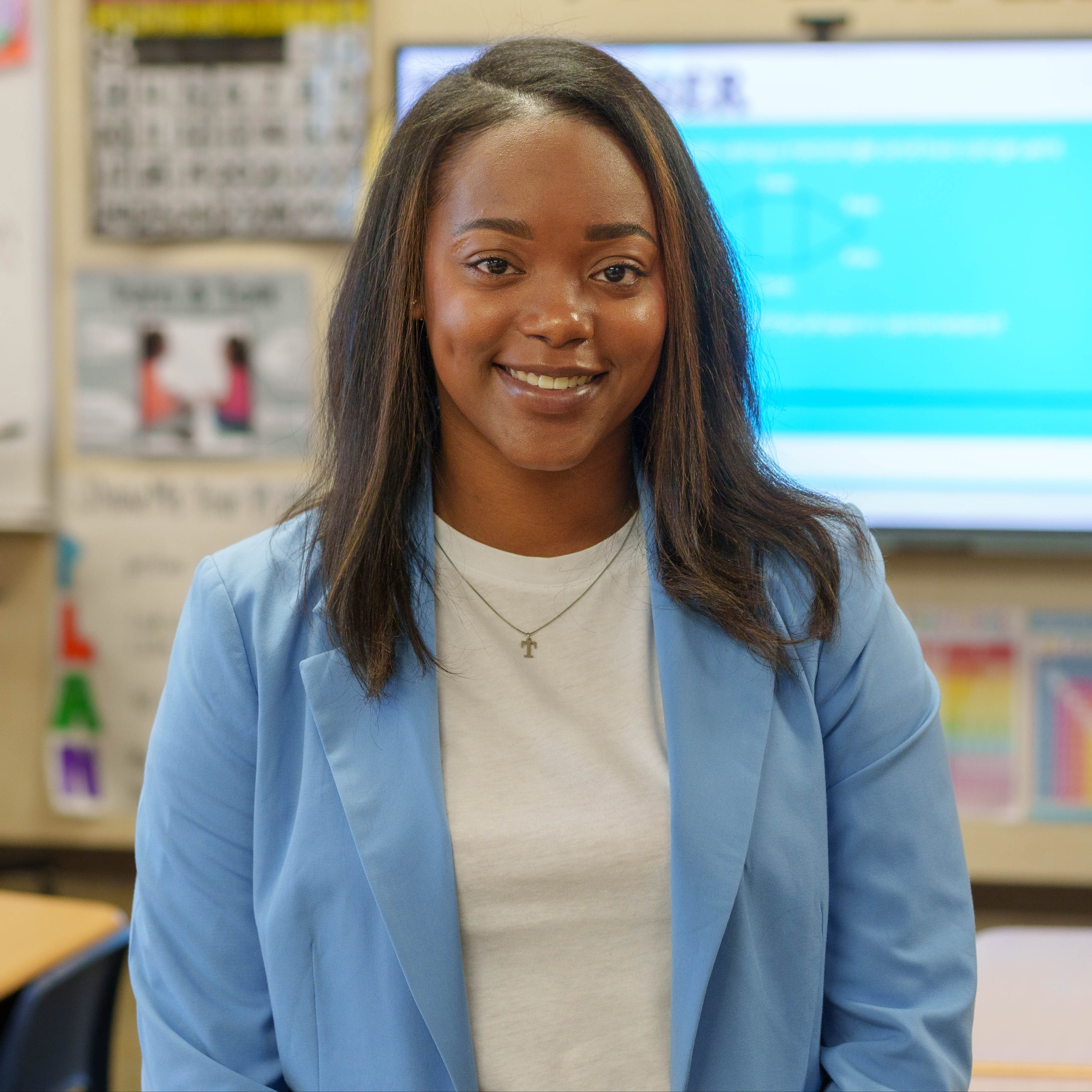 African American woman standing in classroom