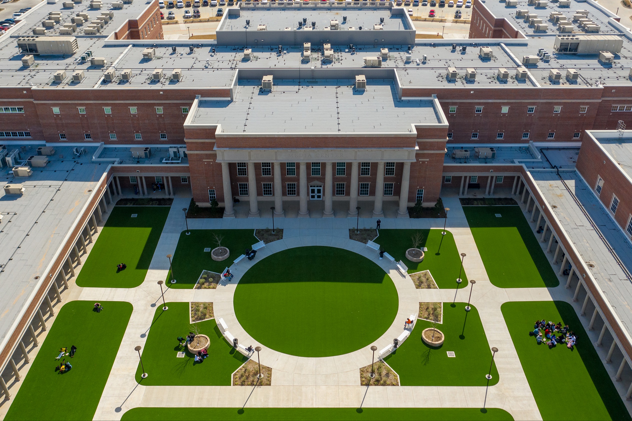 courtyard in middle of brick high school campus