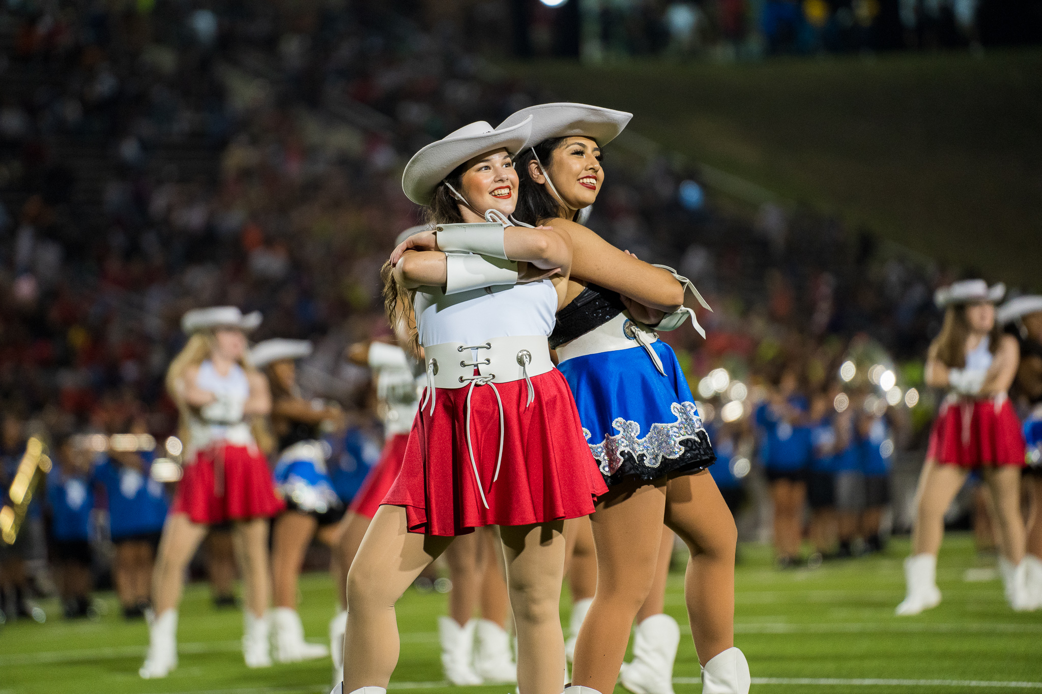 both high school drill teams performing