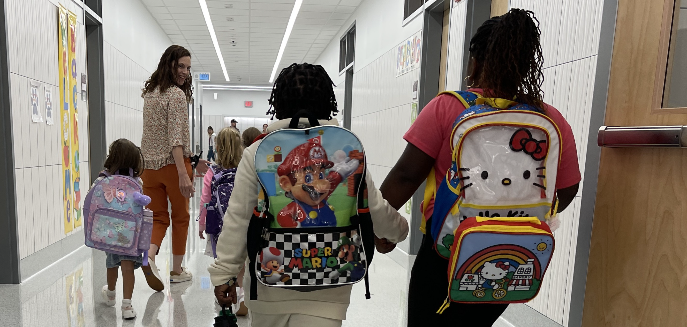 students walking down the hall