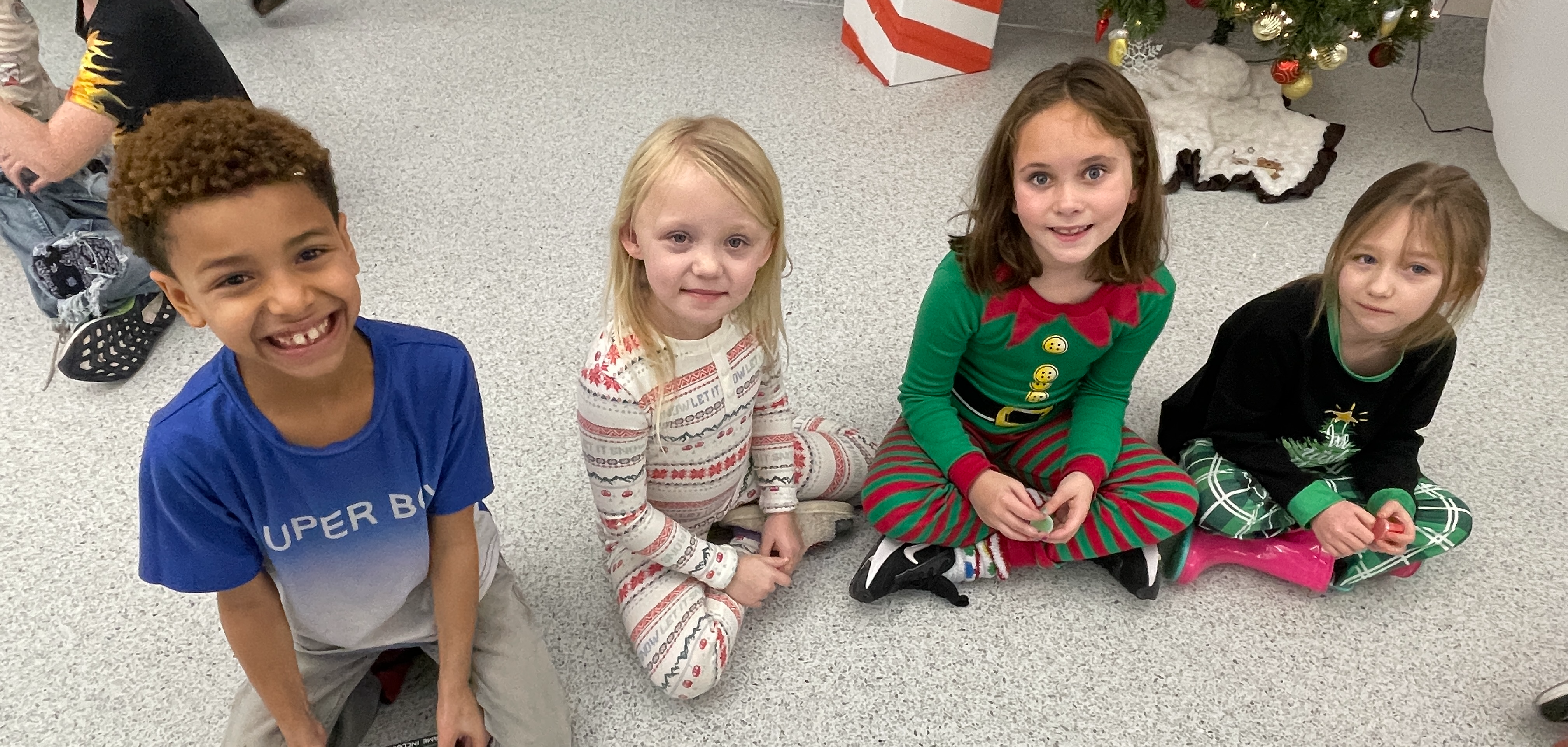 students pose in their christmas jammies