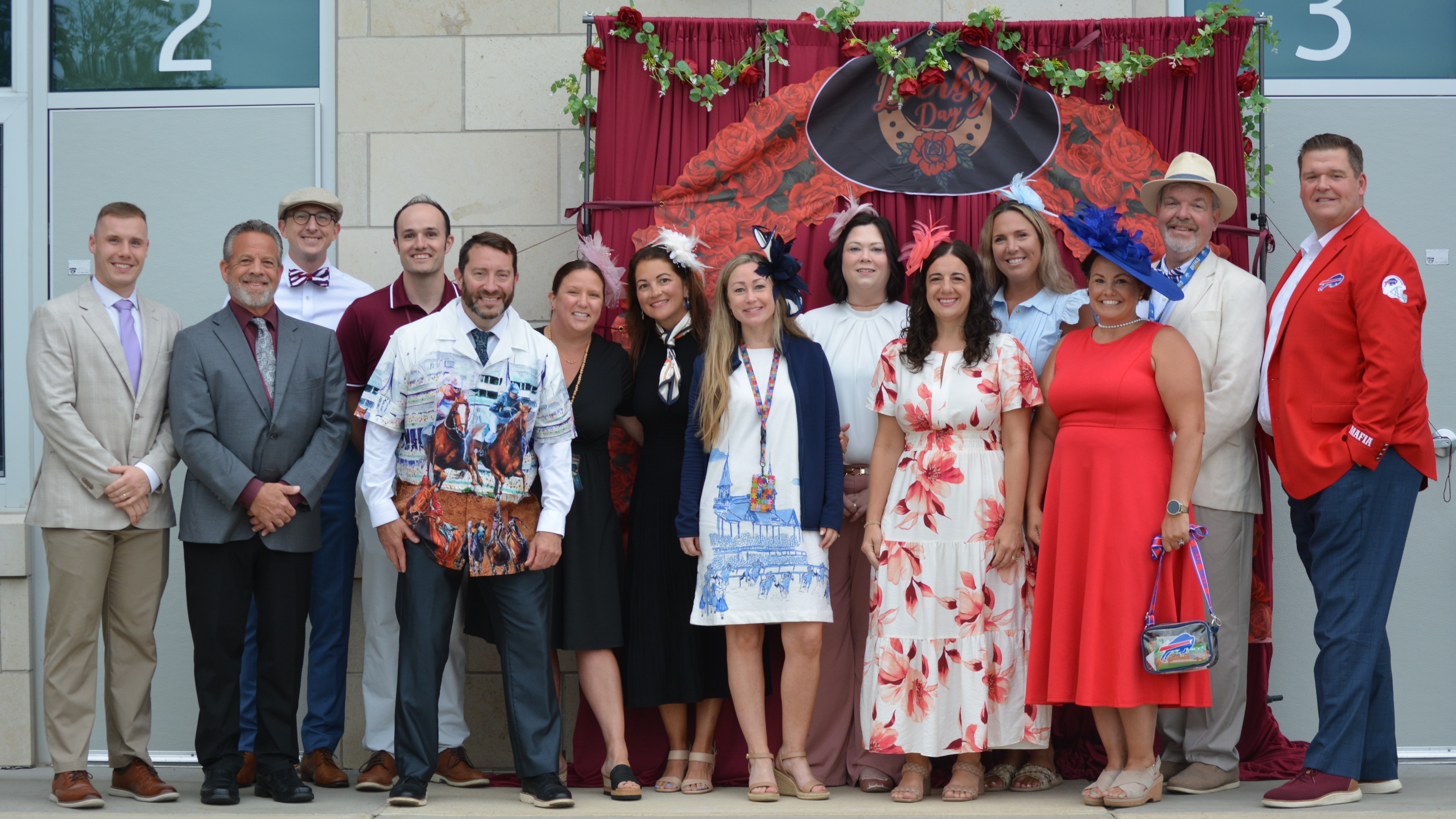 admins pose in their kentucky derby themed outfits